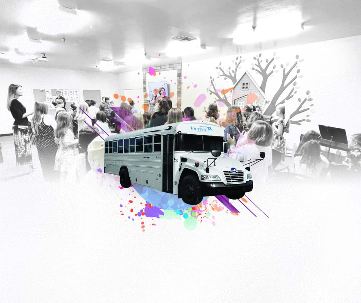 A school bus in the foreground with children excitedly gathering, while adults facilitate an engaging classroom setting in the background.